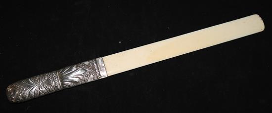 A late Victorian repousse silver handled ivory page turner, London, 1889, 16.5in.